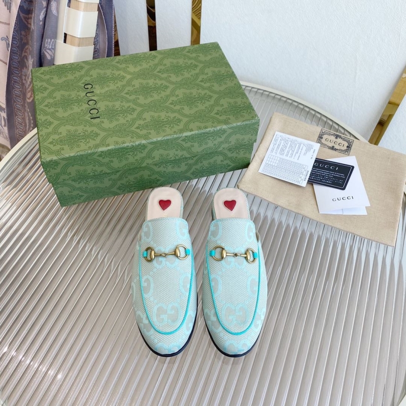 G*u*i slippers